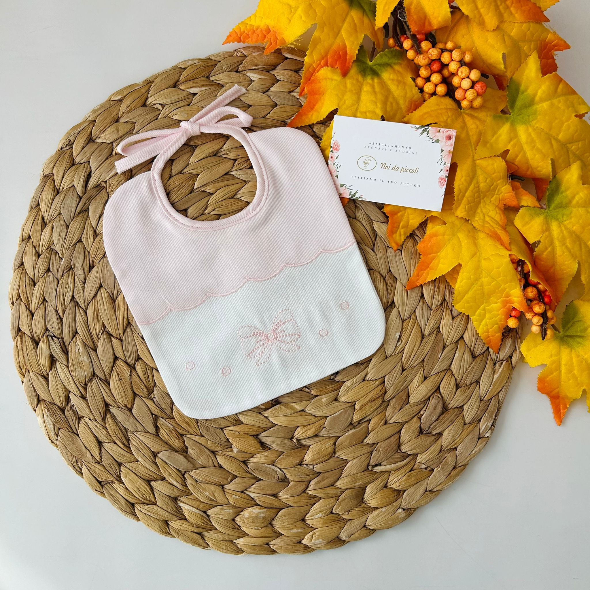 BAVETTA BICOLOR FIOCCO E PALLINI ROSA - Noi da piccoli