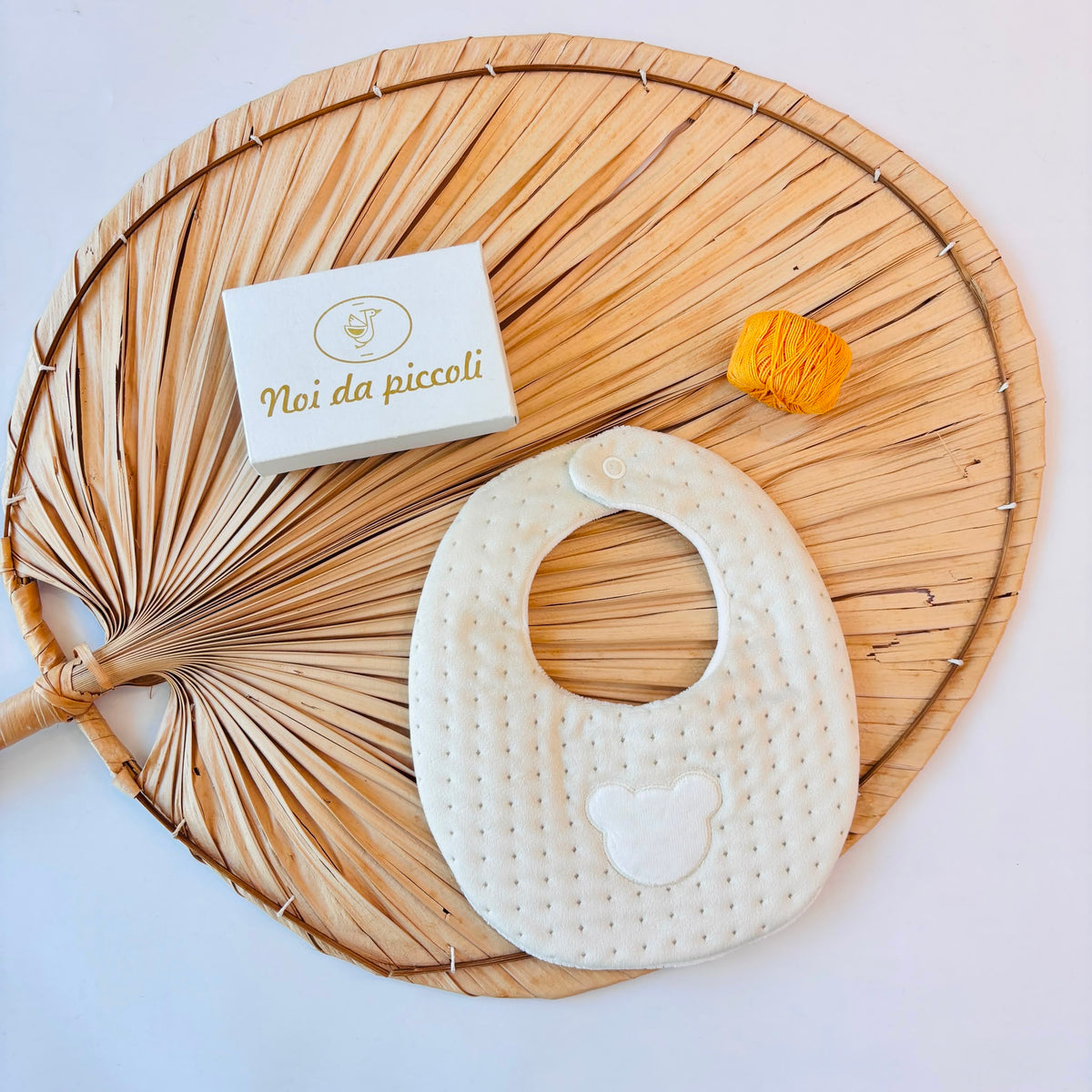 BEIGE CHENILLE BIB WITH TEDDY BEAR Deolinda