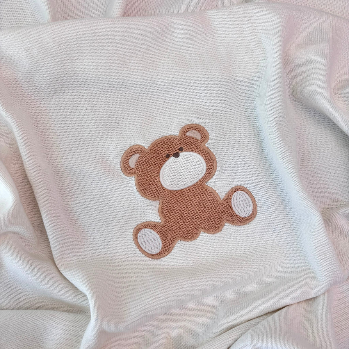 Copertina IN FILATO CALDO CIELO con teddy centrale