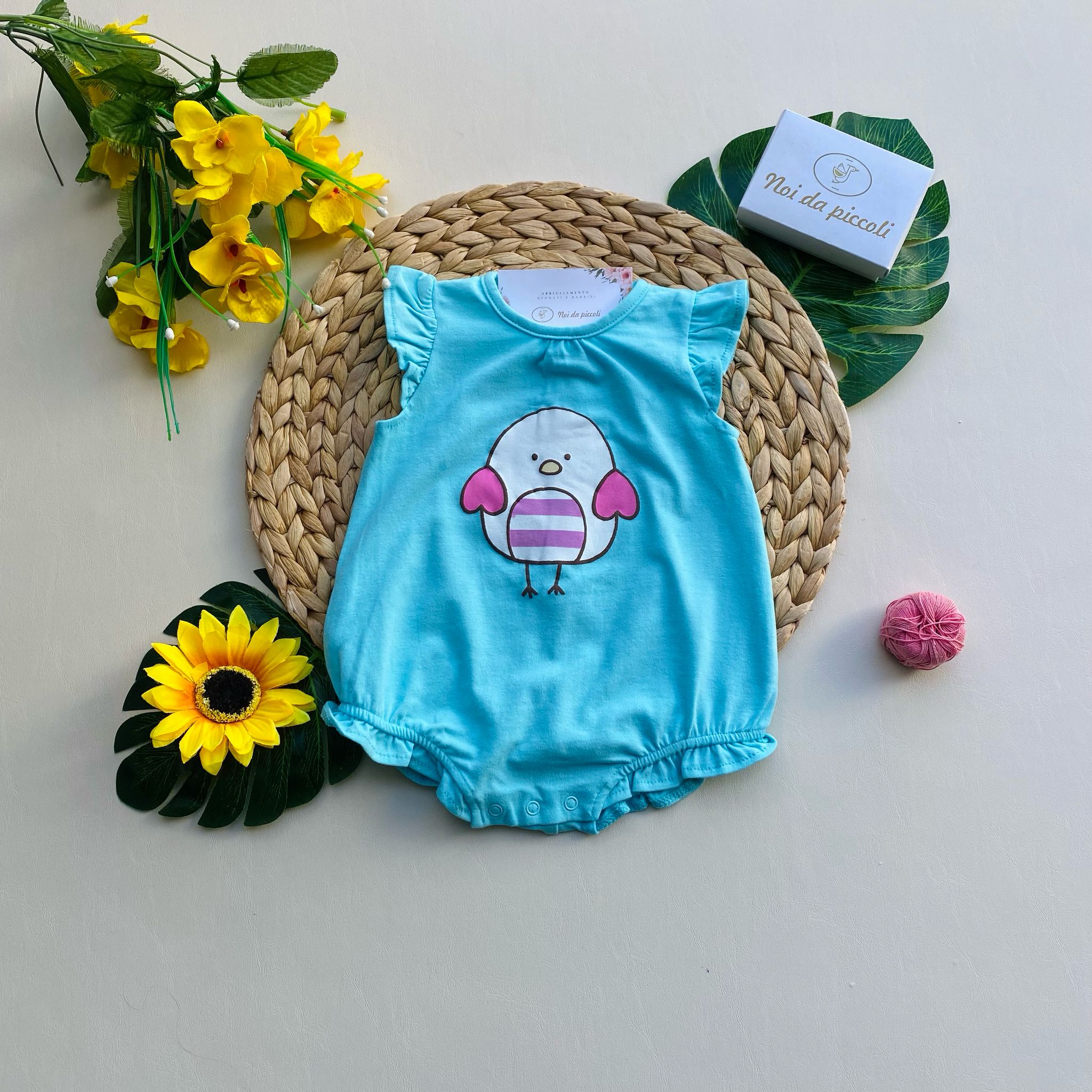 PAGLIACCETTO IN COLORAZIONE AZZURRO CON OCHETTA CENTRALE - Noi da piccoli