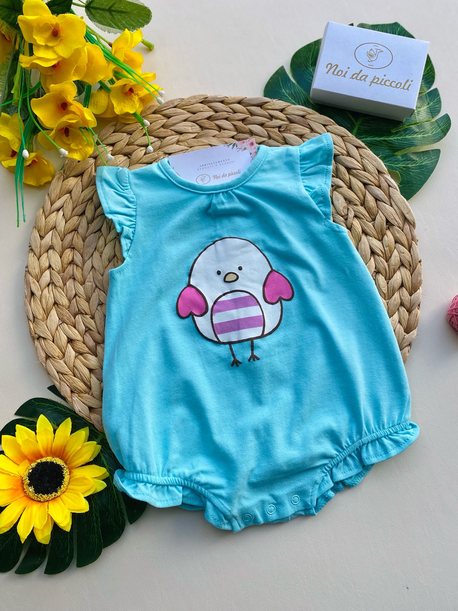 PAGLIACCETTO IN COLORAZIONE AZZURRO CON OCHETTA CENTRALE - Noi da piccoli