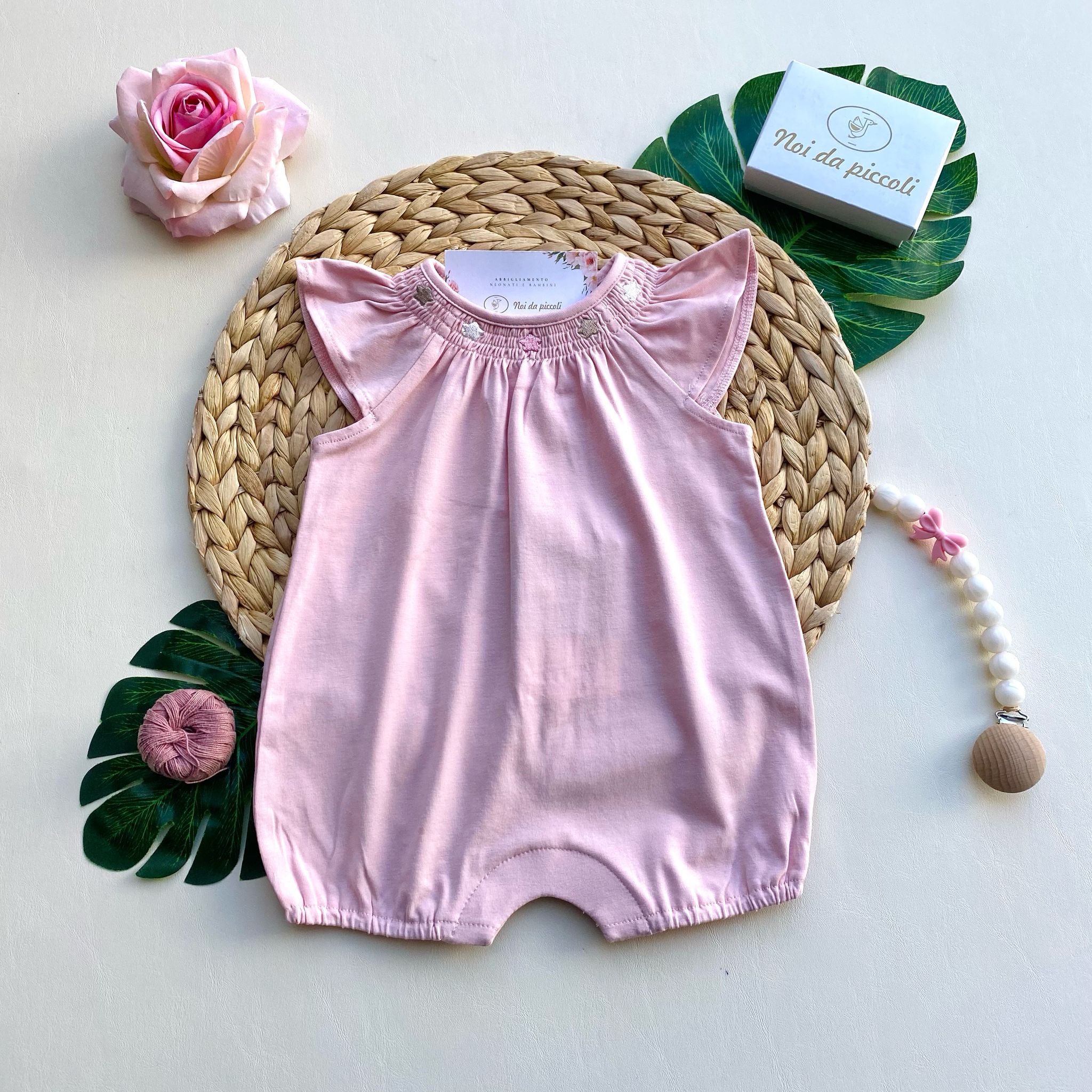 PAGLIACCETTO IN COLORAZIONE ROSA E CON STELLINE SUL COLLETTO - Noi da piccoli