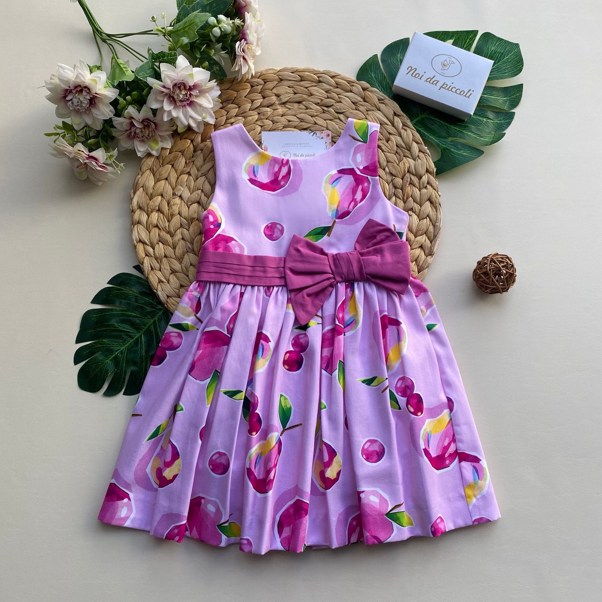 vestina in colorazione rosa e fucsia e fiocchettino centrale - Noi da piccoli