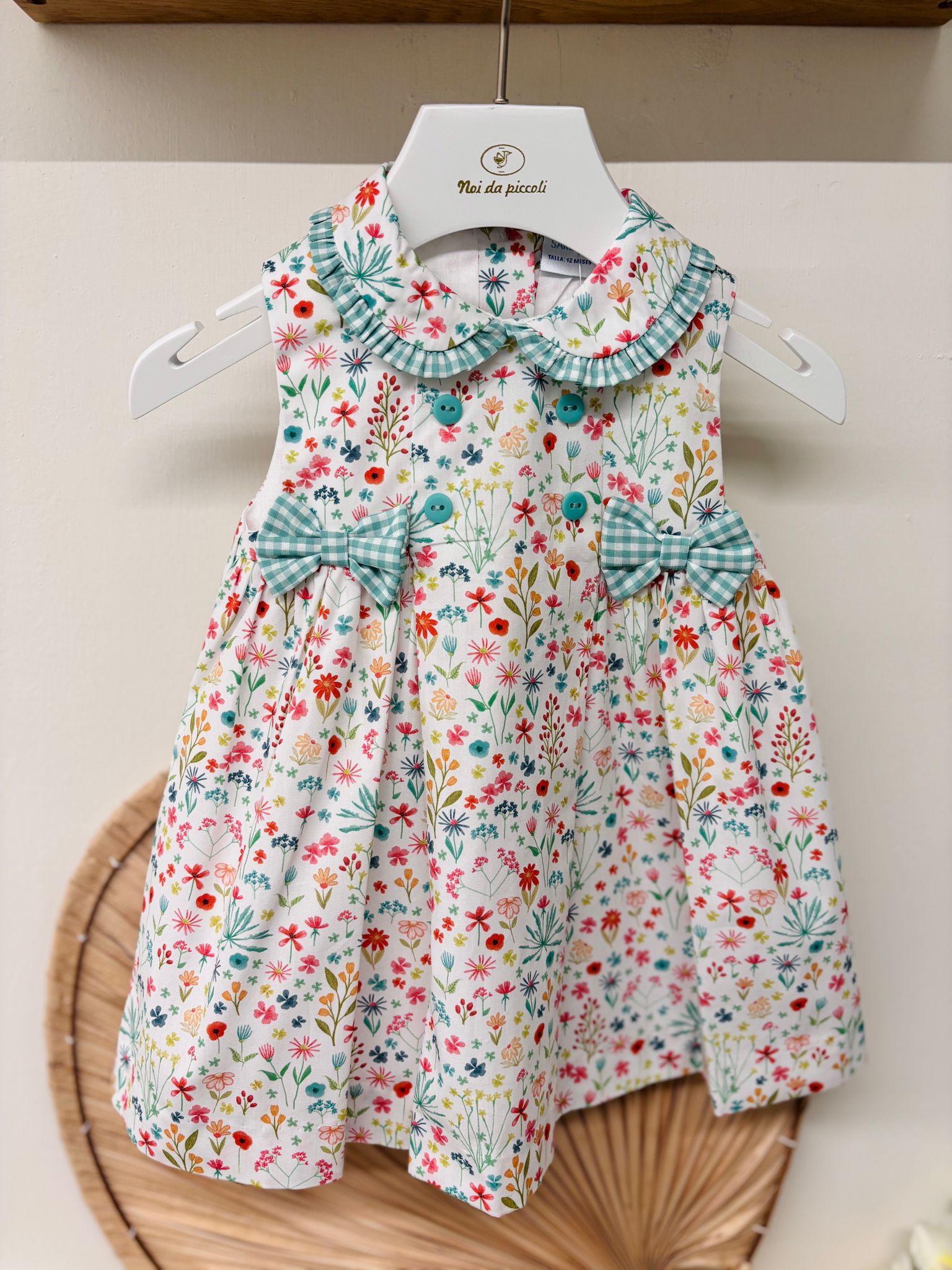 VESTINA IN COTONE CON FIORI E FIOCCHETTI VERDE - Noi da piccoli