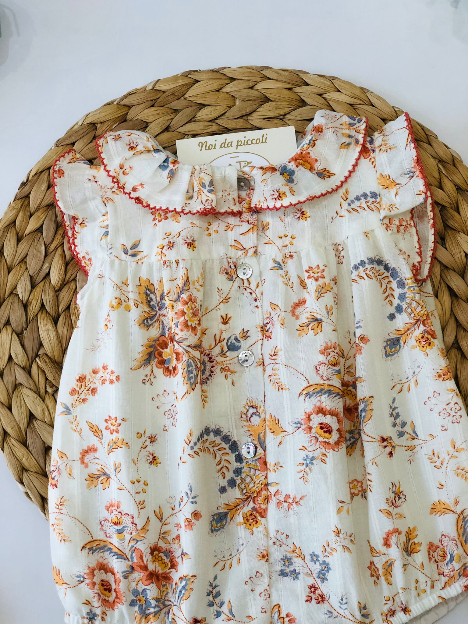 PAGLIACCETTO BIANCO CON FIORI E FOGLIE ARANCIO - Noi da piccoli