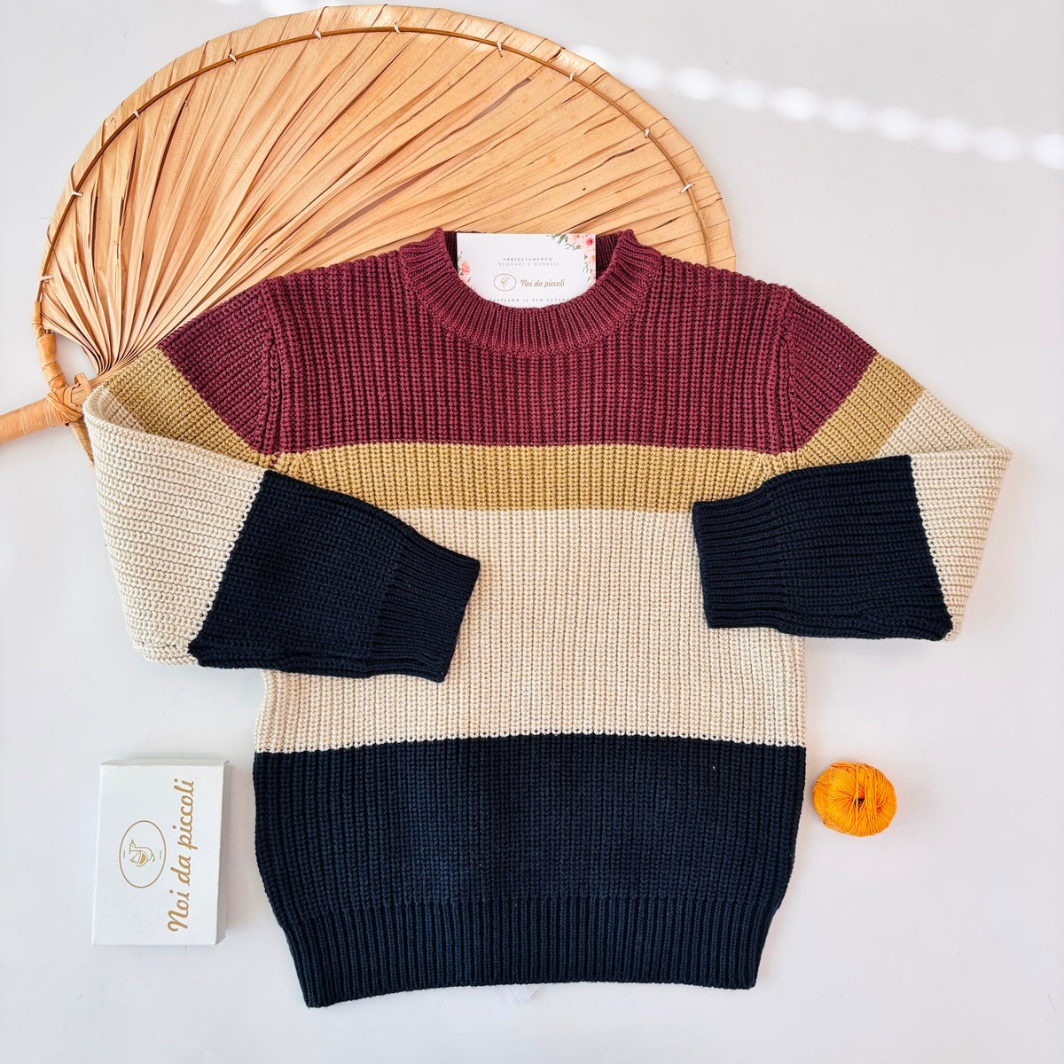 MAGLIONE IN FILATO CALDO CIRUELA A RIGHE