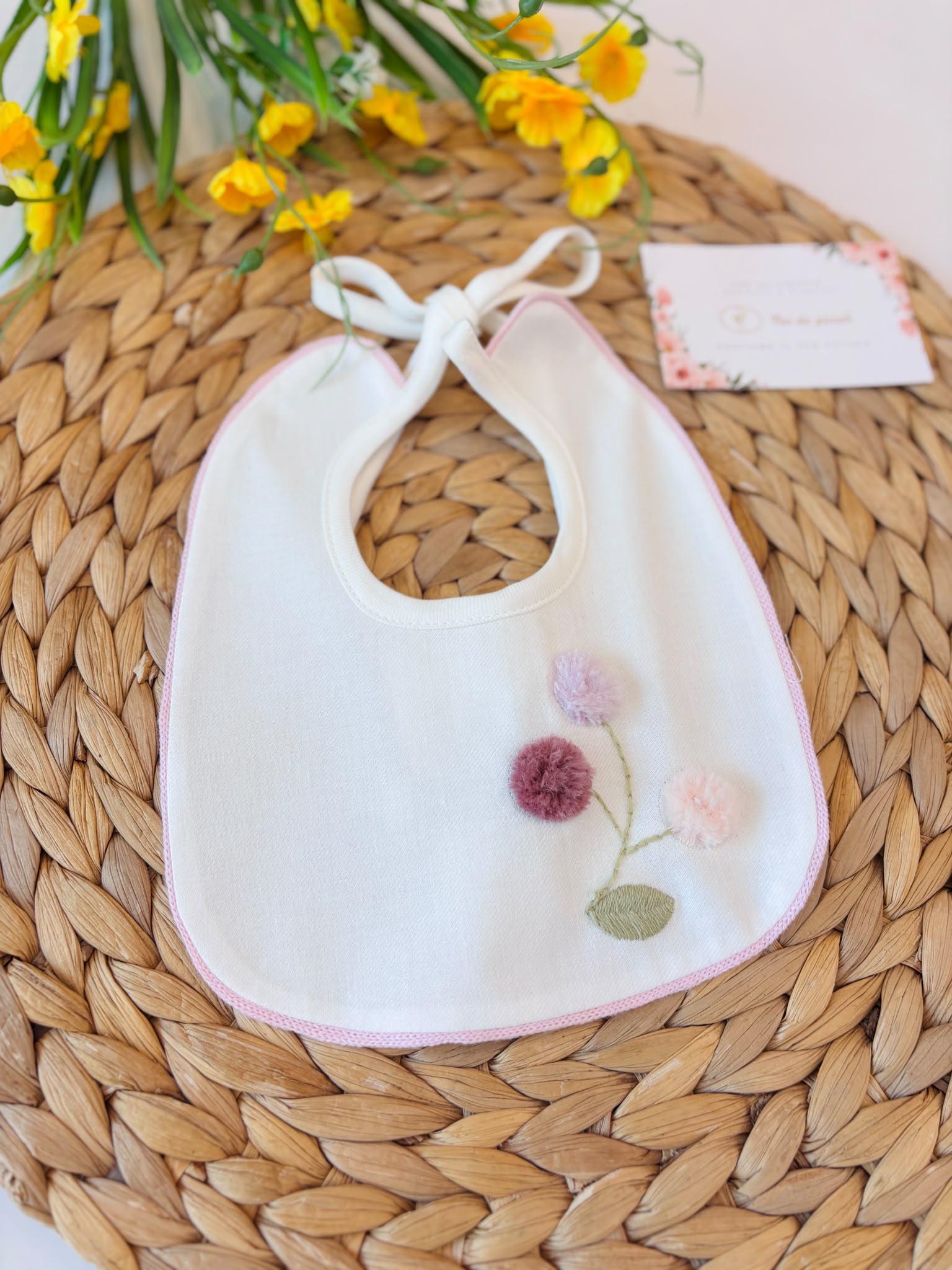 BAVETTA IN COTONE BIANCO FIORELLINI PONPOM