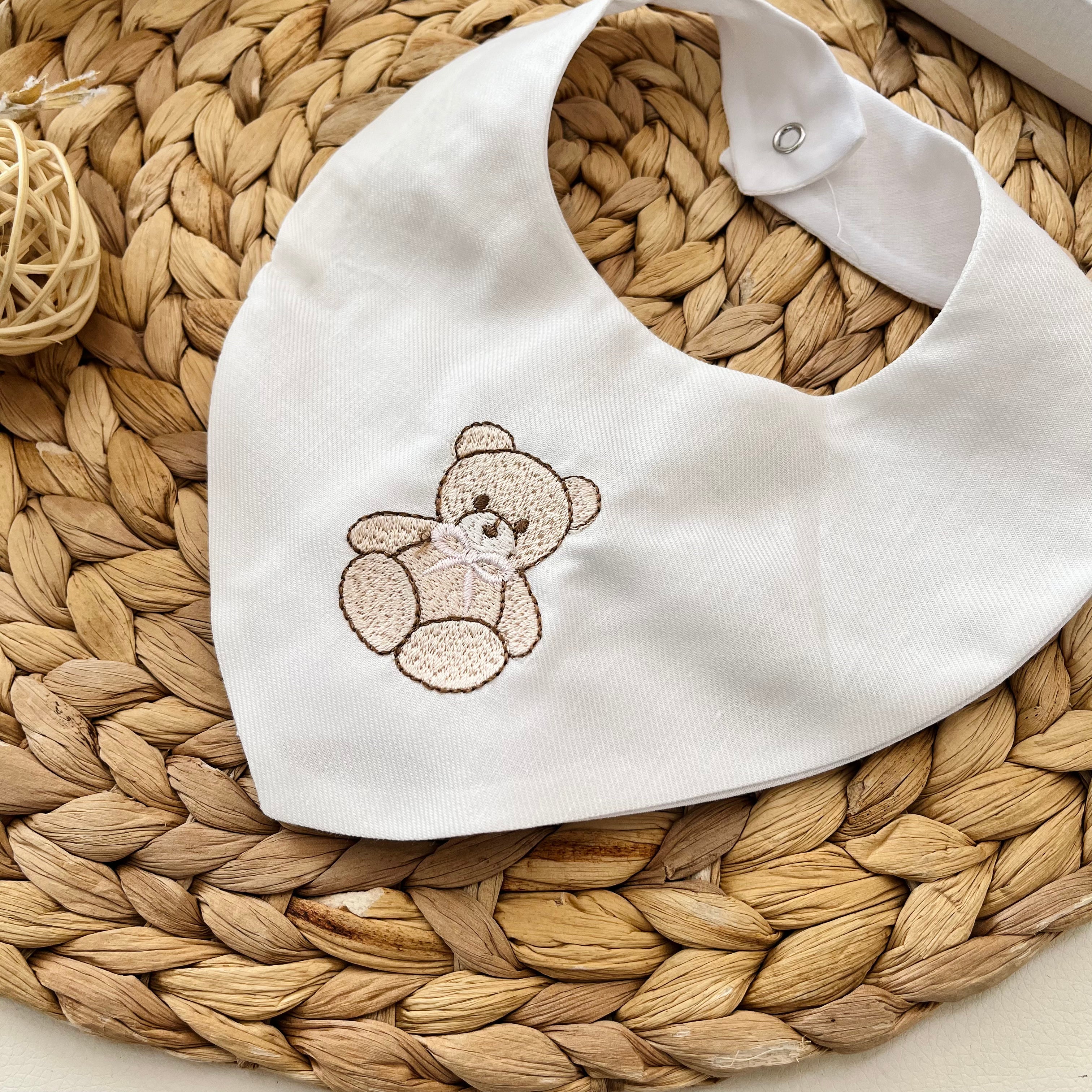 CREAM BEAR BIB WITH PINK BOW