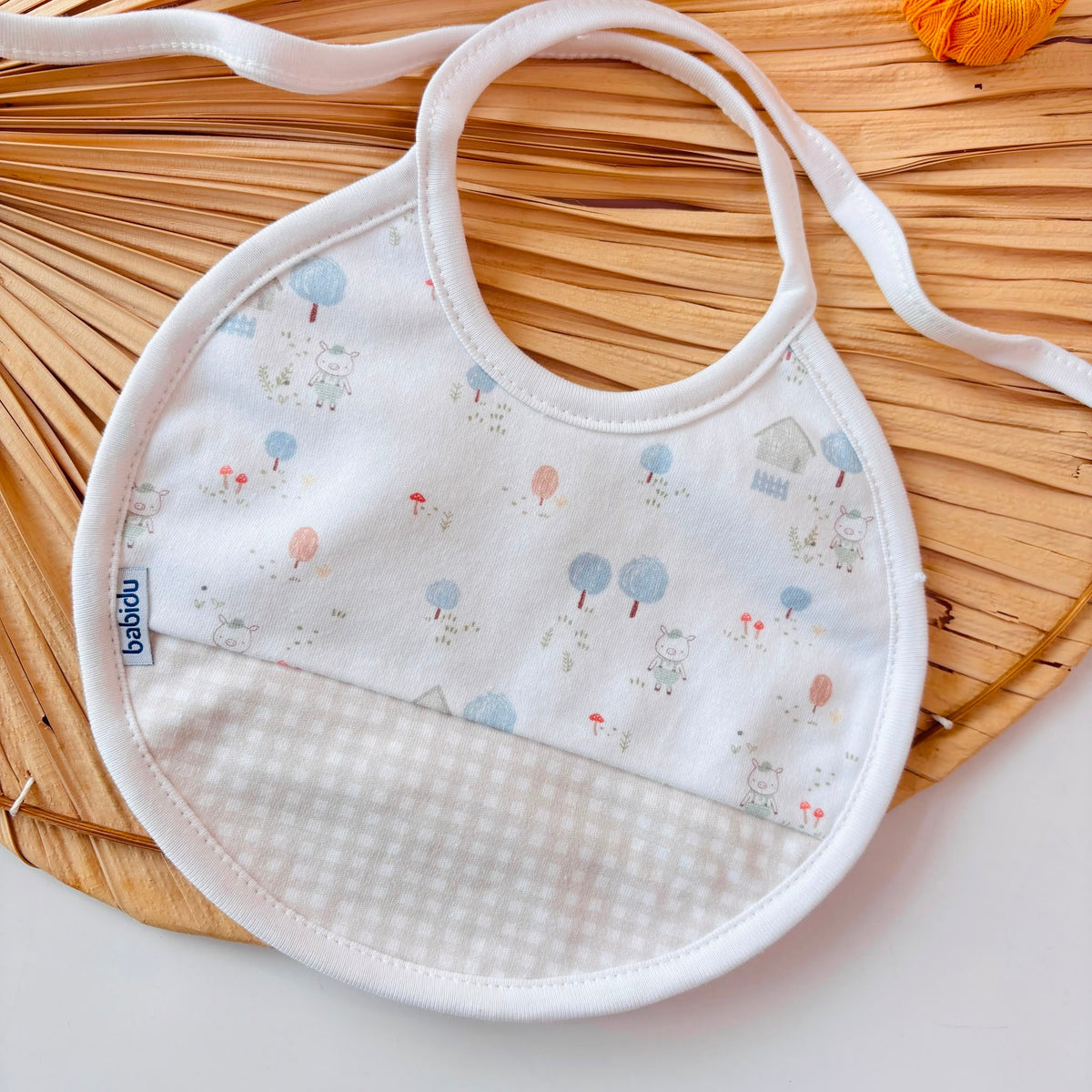BAVETTA con delicata fantasia IN COTONE CALDO BEIGE - Noi da piccoli