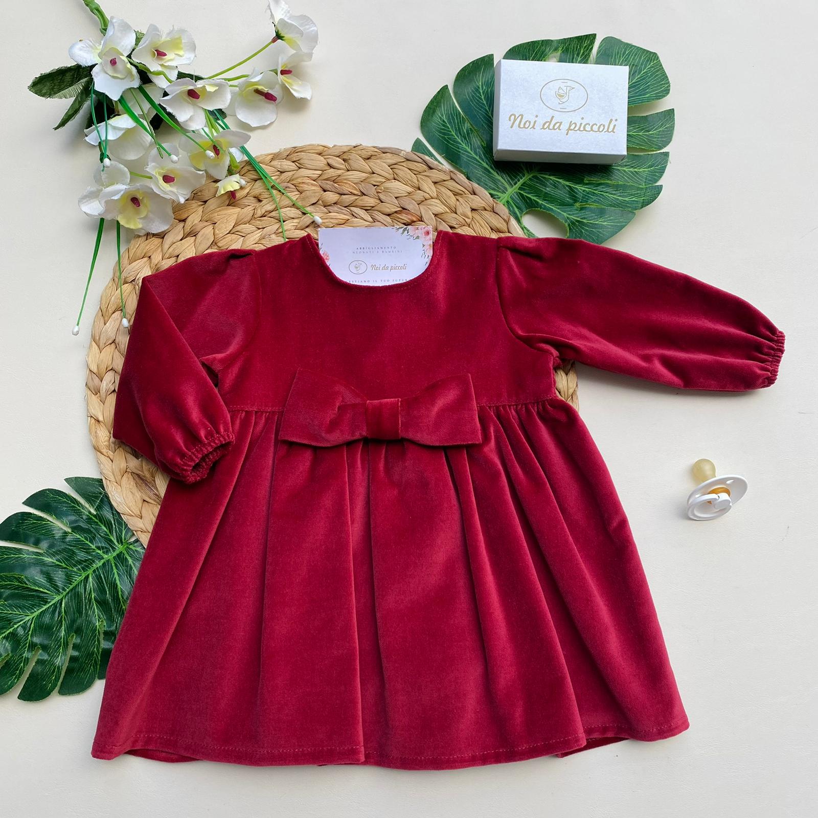 Dress with ruby red bow in velvet